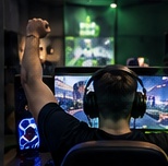 Friends celebrating a win during a gaming session
